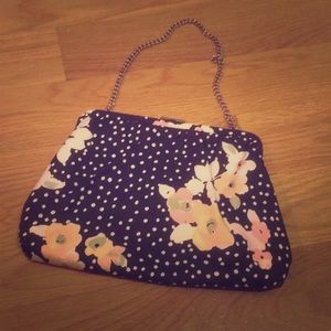 Dark purse with flower design